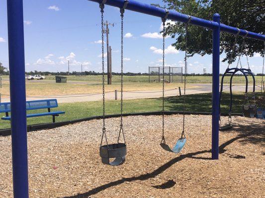 Swings. There's a cool double swing where the baby can sit on one side and an adult can sit on the other side facing the baby.