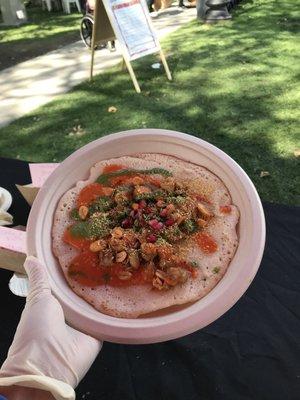 Secret Menu: Indian  pancake topped with cilantro mint & garlic tomato chutneys, lentil chips, chopped onions , peanuts, pomegranate