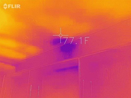 Infrared image of ceiling and wall damage from roof leak