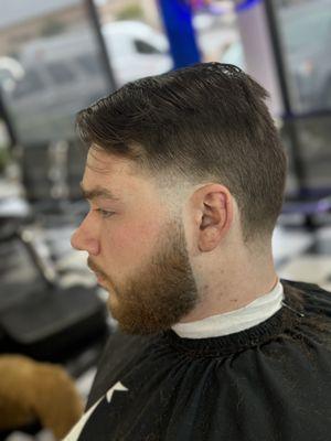 Taper with a combover and beard trim