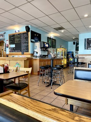 Inside of shop - neat, clean, tidy; lots of seating, full bar, draft brews, extensive menu, SUPER REASONABLE PRICES, big portions