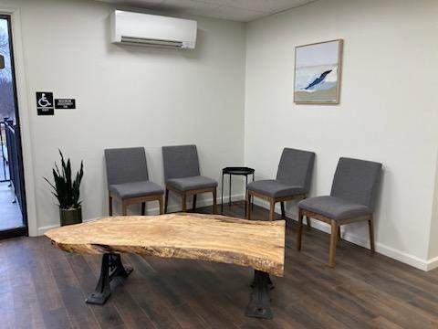 The Emmaus waiting area includes natural light, complimentary drinks and accessible restrooms for those who may wait outside during sessions