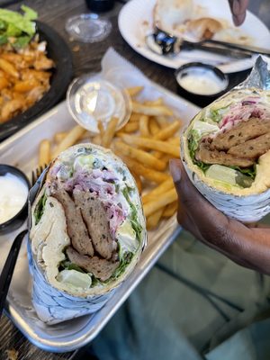 Gyro platter with fries on the side.