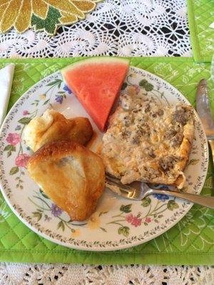 Amazing breakfast! Watermelon, sausage egg dish and homemade monkey bread!