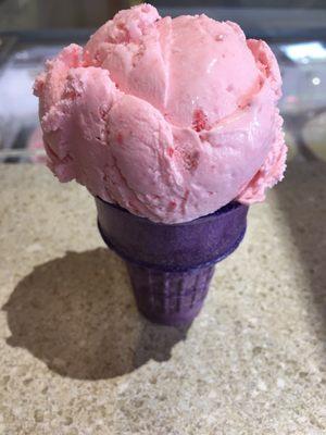 Strawberry on a purple cone