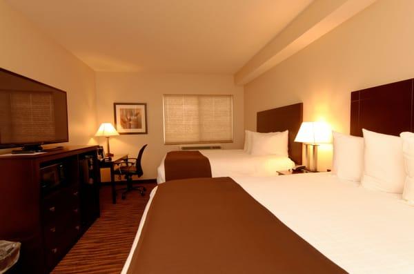 Standard room with two queen size beds. All rooms have mini fridges, microwaves and 50" televisions.