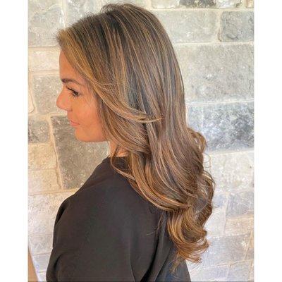 Honey balayage with curtain bangs