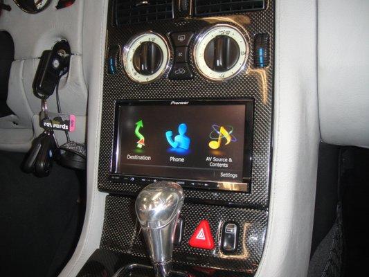 Mercedes SLK custom double din install with carbon fiber trim work