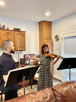 My student is practicing and sounding great! She enjoys playing in orchestra and performing!