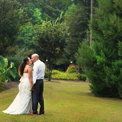 Beautiful Bride and 
 Groom Portraits taking in the side yard.