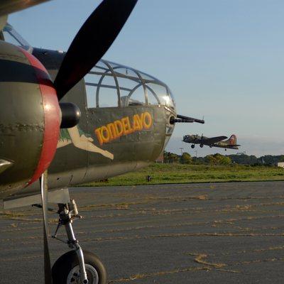 B-25 with B-17 taking off in the background.