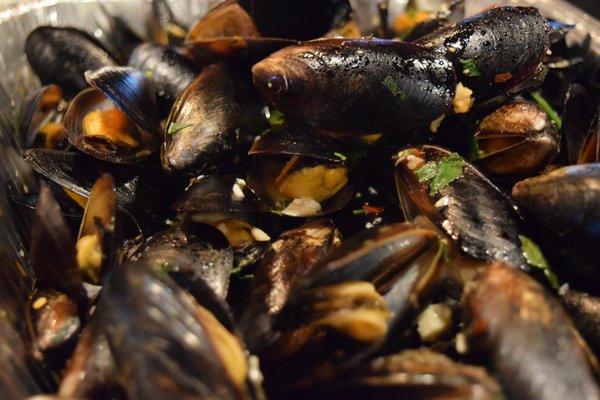 Steamed Mussels with a high garlic white wine sauce