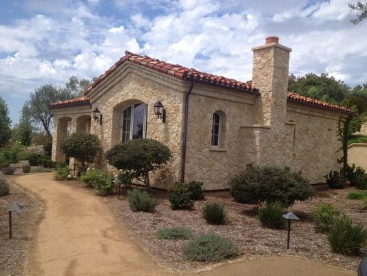 Quest house with natural stone veneer