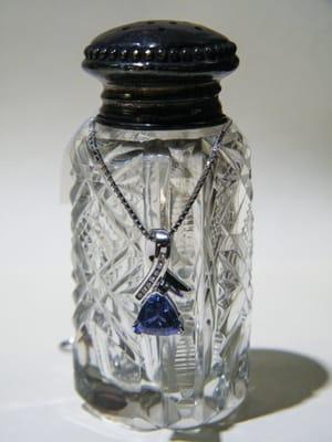 An estate piece: A 14kt white gold pendant with a 2.4ct tanzanite and .7ct of diamonds.