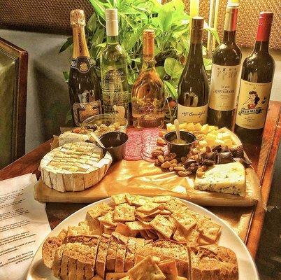 Five wines perfectly paired up with cheese & charcuterie at one of our Sommelier hosted private wine events