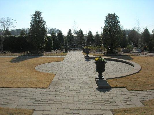 Once again Envisions was handed a blank clay field and set the grades, installed the walkways and patios to create this  Wedding Garden.