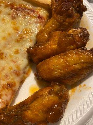 I ordered buffalo wings and pizza. My food was delivered cold and the pizza looks like a medium not a large the wings are wet