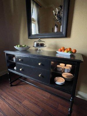 The finished buffet with glass shelves.