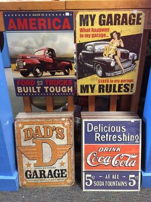 Over 200 varieties of vintage tin signs