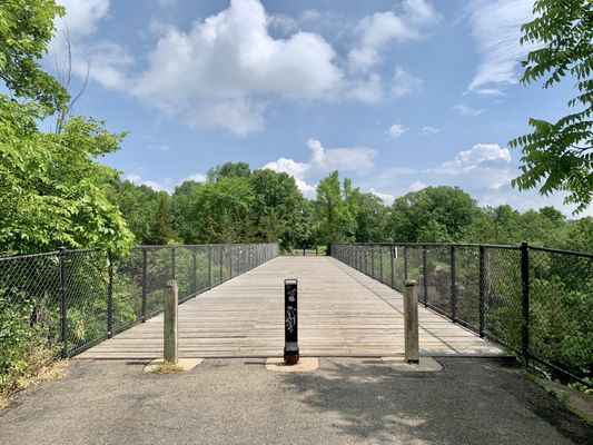 The pedestrian bridge in the park high above the Vermilion River.