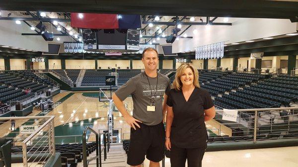 TDS Office Manager, Lori, admiring the awesome facilities at Prosper High School with Coach Jon Ellis.