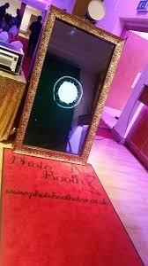 Walk up the red carpet and touch the Magic Mirror to start your photo booth experience!