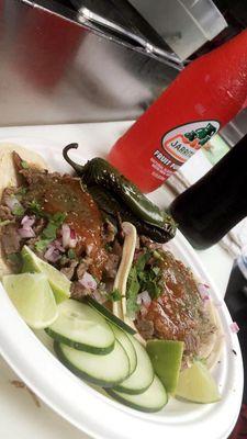 Carne Asada tacos with red salsa