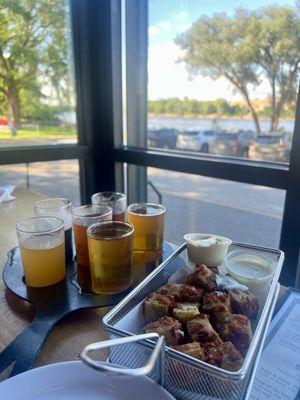 Window view, cheese curds, beer flight