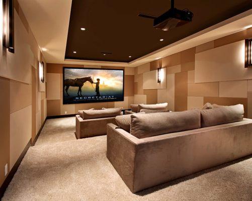 A modern Home Theater room with a beautiful wall acoustic material layout.