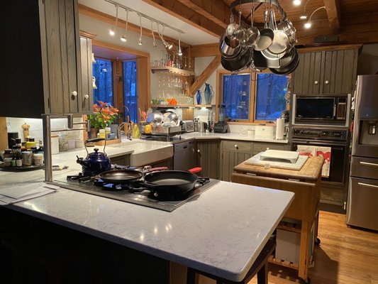 Our new counters/ sink/backsplash/ shelves and faucet.