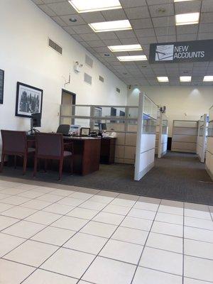 Empty customer service area. The one banker is at lunch. It's the time most people can bank and there's no one here.