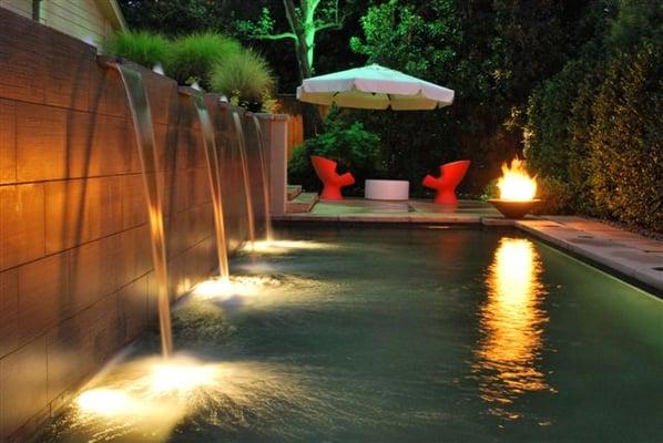 LED Landscape lighting designed with architectural lighting on the pool.