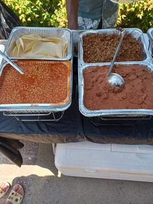 Taco meat refried beans  and shells with veggie beans