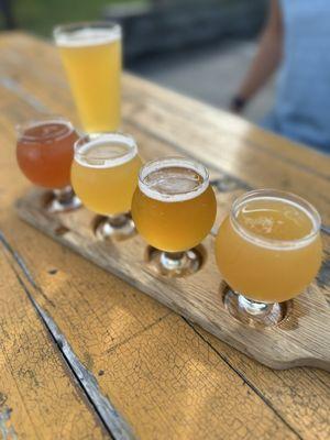 Beer flight! Blueberry Sour, jalopeno lime pale ale, Waimea west coast IPA and DIPPAH double IPA. Pint of classic - Lone Wolfe IPA