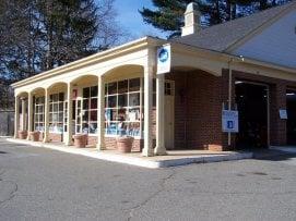 Lexington Auto Center at the corner of Maple St and Mass Ave in Lexington MA