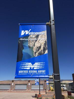 Boulevard banners produced for the Montrose Regional Airport featuring aerial photography