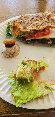 Sample meal with veggie burger, nachos(Not pictured), almond bite and other sandwich.