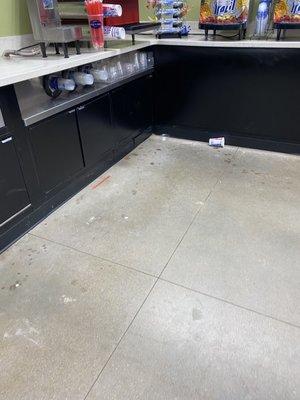 Cups and trash all over the floor