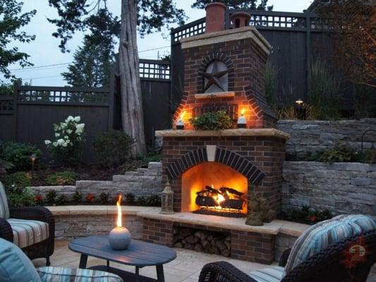 Native Minnesota Kasota Stone - Dolomite - Fon du Lac Stone - Clay Bricks make this fireplace a stunning feature.