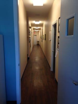 Our hallway. Door on the right, room number one! Next hall on the left = bathrooms, back left = room number two