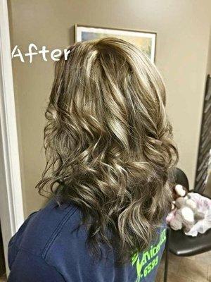 Icy blonde highlights with a dark brown base. LOVE this layered cut!