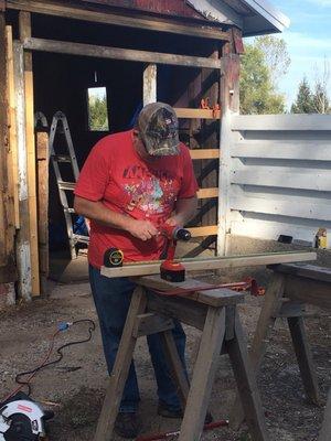 Barry embracing our refurbishing/building adventure.  Counseling by day and project manager on weekends.