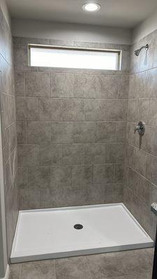 Tile work and shower pan installation