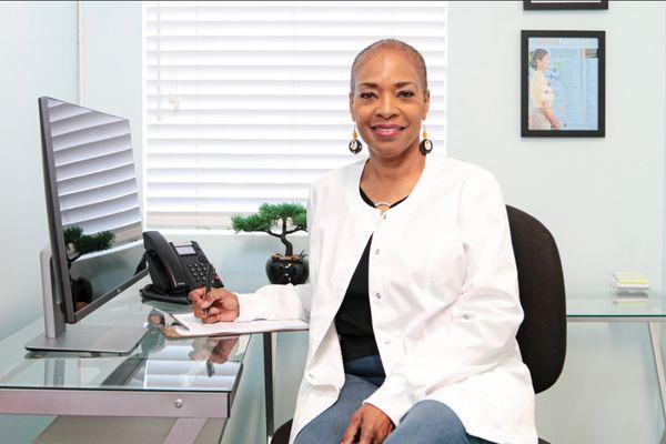 Dr. Pickford in her office.