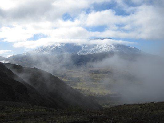 Patiently waiting for the clouds and mist to dissipate.