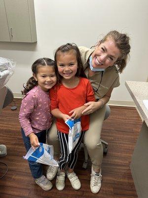 Dr. Mindy with 6 and 4 year-old patients