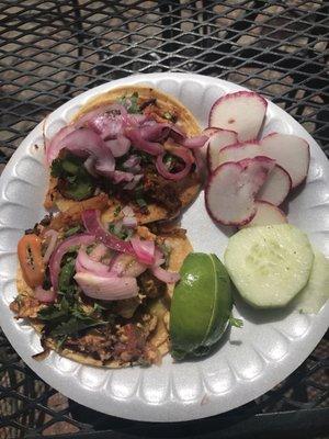 Top is al pastor, bottom is chicken (they are served topped with onions and cilantro but I like to add pickled onions to mine as well)