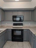 another angle, new sink was install with new garbage disposal. The bottom cabinets are final paint, where the top are with the primer. -- at