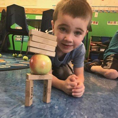 Building can be more than just blocks- how many items do YOU think could balance on this apple?