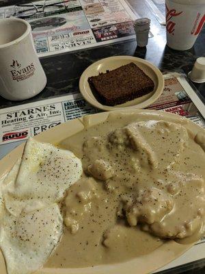 Gravy Biscuits with two over easy eggs and extra crispy livermush!